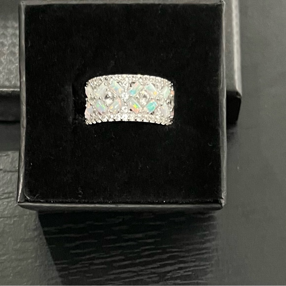 Sterling silver lab created opal and white sapphire X ring